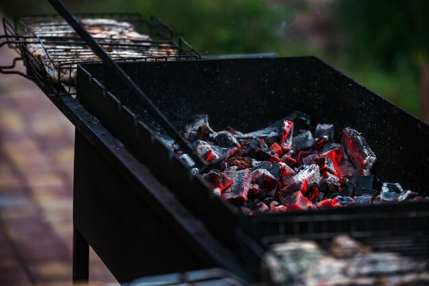 Grill with coals