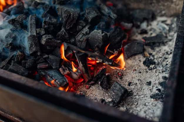 Grill with coals